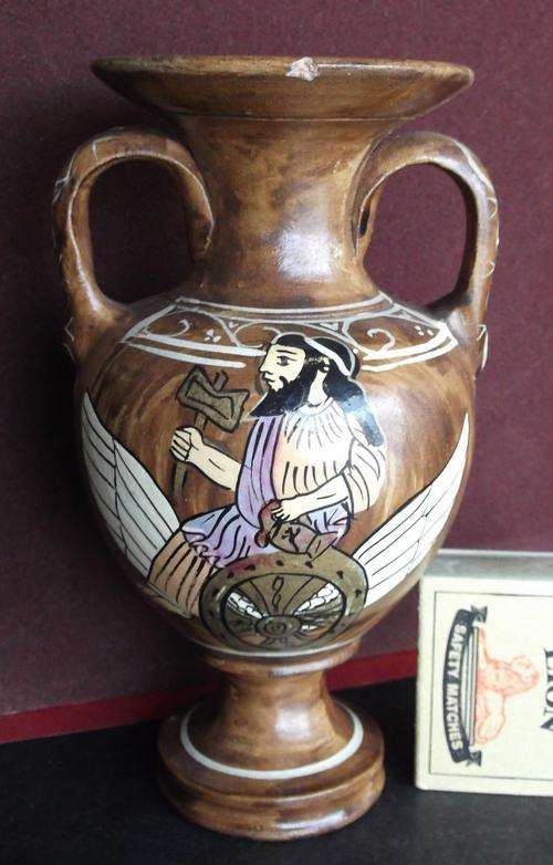 Clay urn made in Greece, small chip