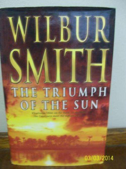 WILBUR SMITH BOOK - THE TRIUMPH OF THE SUN LOT 442