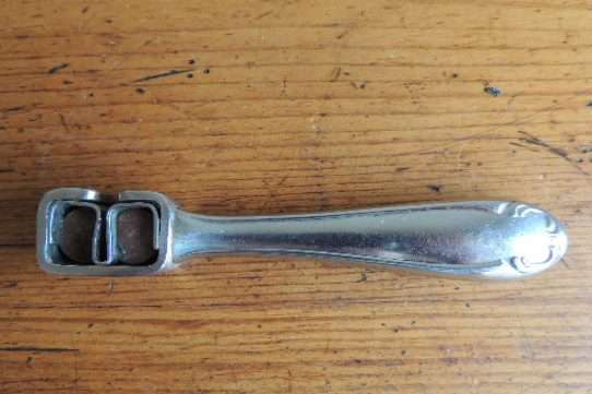 VINTAGE PLATED KNIFE SHARPENER