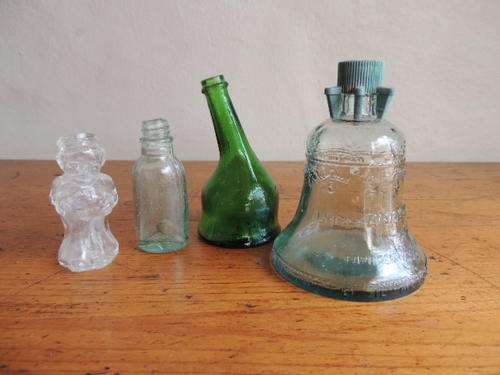 FOUR ASSORTED VINTAGE BOTTLES