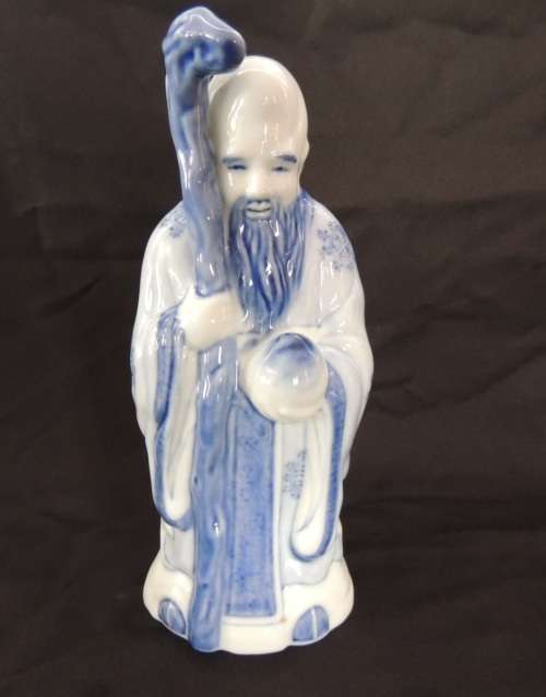 CHINESE FIGURINE OF A BEARDED MAN