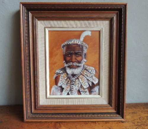 MIZRAIM MASEKO - OIL PAINTING ON HAND TOOLED LEATHER - ZULU INDUNA"