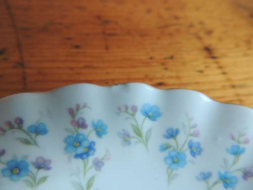 ROYAL ALBERT SAUCER - "MEMORY LANE" - SLIGHT FACTORY FAULT