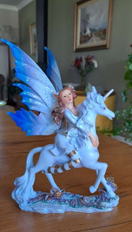 Fairy Riding a Unicorn