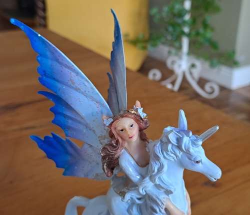 Fairy Riding a Unicorn