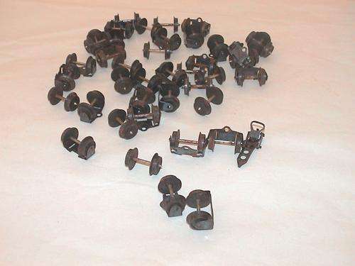 HO GAUGE COLLECTION OF WAGON WHEELS MAKE UNKNOWN IN GOOD CONDITION.