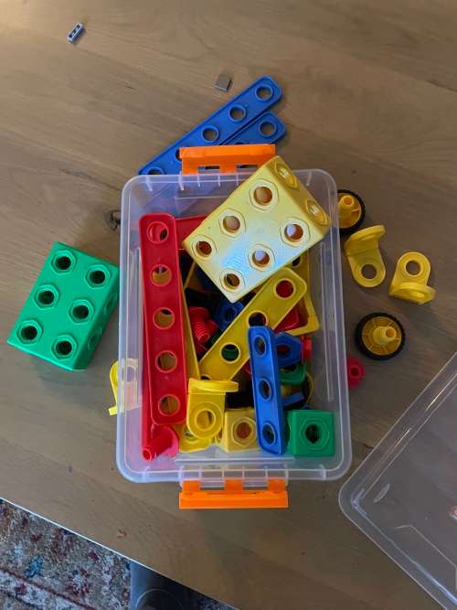 Junior engineer building toy