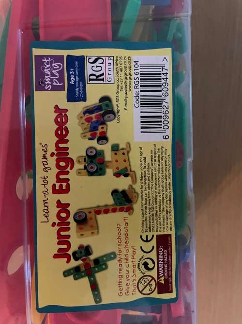 Junior engineer building toy