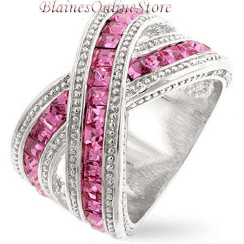 STUNNING 5.70CTW PINK SAPPHIRE CROSSOVER RING!
