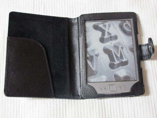 KINDLE 4!! Brand new, including KINDLE LIGHT, BLACK COVER as well as a waterproof cover