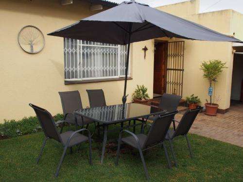 Patio/Garden Furniture Set (6 seater), umbrella included (Collection JHB only)
