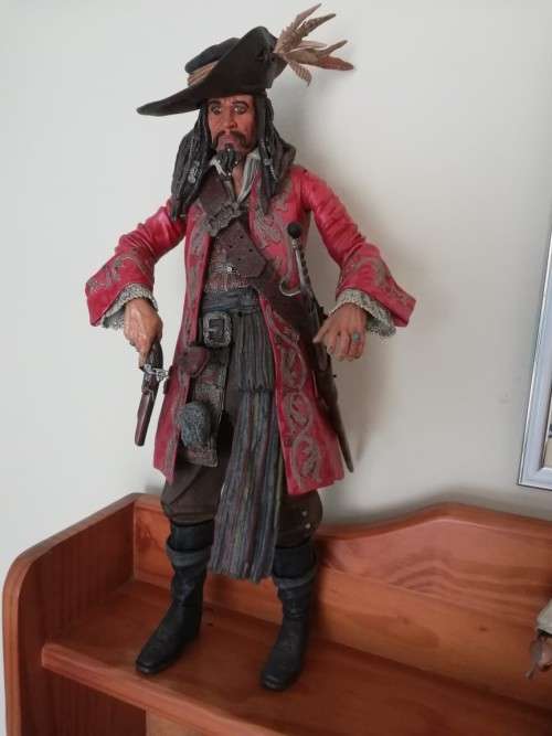 Pirates of the Caribbean figurines (bid for all three)