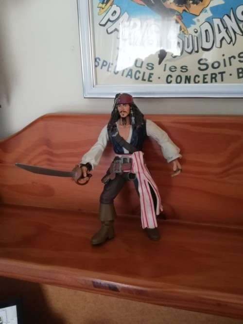 Pirates of the Caribbean figurines (bid for all three)