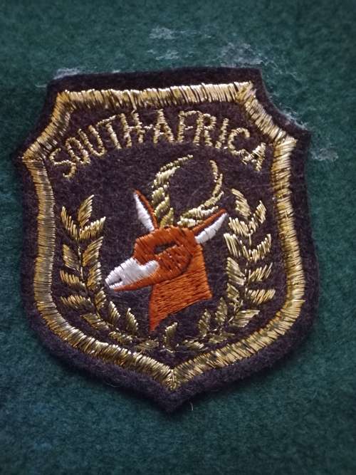 SPRINBOK BADGE 1950s-INTERNATIONAL SCROLL- WITH 29X EMBROIDERED BADGES