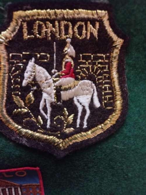 SPRINBOK BADGE 1950s-INTERNATIONAL SCROLL- WITH 29X EMBROIDERED BADGES