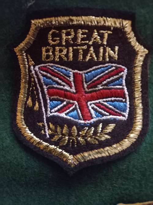 SPRINBOK BADGE 1950s-INTERNATIONAL SCROLL- WITH 29X EMBROIDERED BADGES