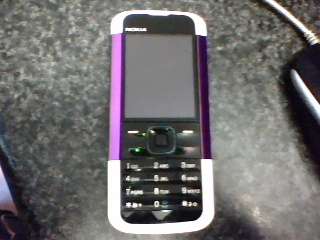 Nokia 5000 & charger (Shipping R40)