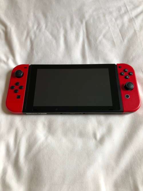 Nintendo Switch Console with Red Controllers (Mario Odyssey Edition) + Extras
