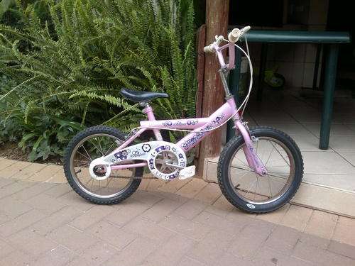 Girls Bicycle (size 16) with new tyres and tubes just fitted with extra training wheels