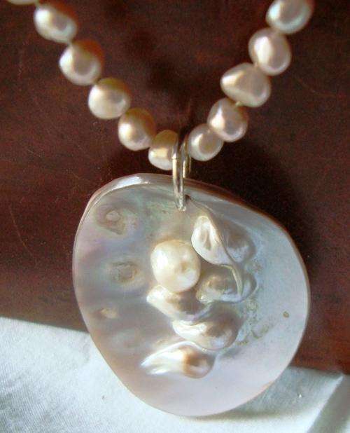 Beautiful Biwa Pearls with Blister Pearl Pendant