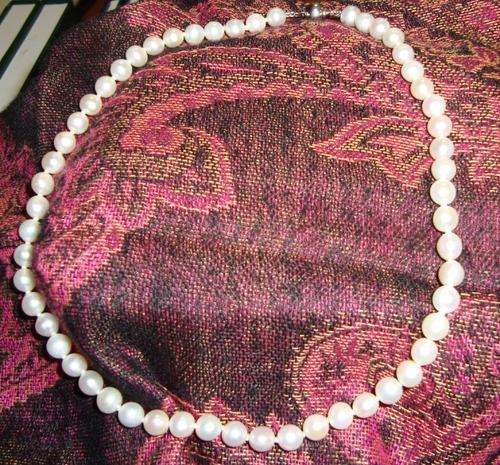 Genuine Pearl String. White Even-shaped. Stunning lustre. Sterling Silver Clasp