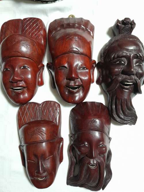 5 EASTERN ROSEWOOD MASKS/ PLAQUES