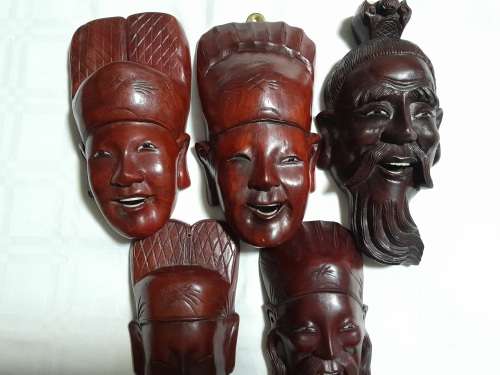 5 EASTERN ROSEWOOD MASKS/ PLAQUES