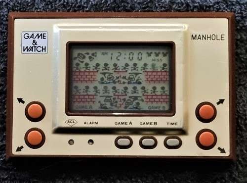 RARE!! NINTENDO GAME AND WATCH MANHOLE (MH-06) GOLD SERIES 1981