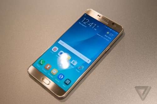 SAMSUNG GALAXY (SM-J700H/DS) J7 Dual SIM with charger as new, spotless. This one is in gold.