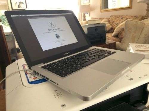MacBook Pro 13-inch, Core i5, 4GB, 500 GB hard drive and 2.5GHz, see photos of actual item.