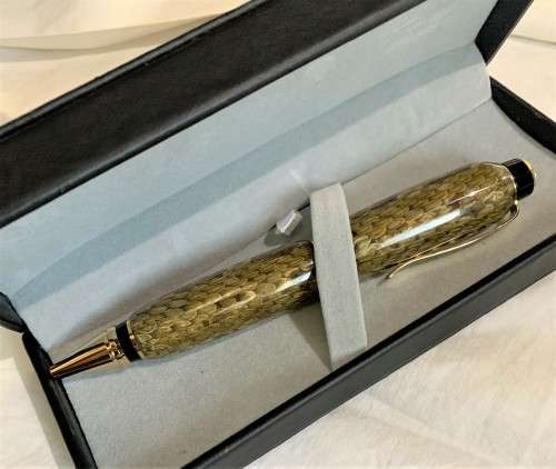 Made from Diamondback Rattlesnake snakeskin cast, The Cigar Pen