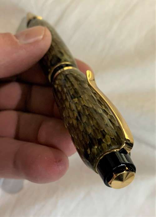 Made from Diamondback Rattlesnake snakeskin cast, The Cigar Pen
