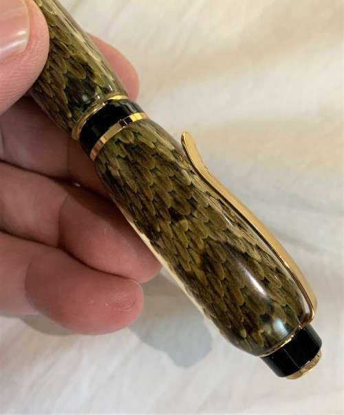 Made from Diamondback Rattlesnake snakeskin cast, The Cigar Pen