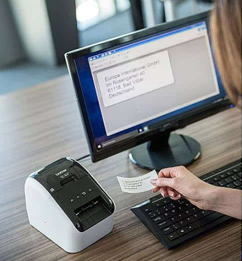 Brother QL-800 Corporate Label Printer plus 4 new packs of labels.