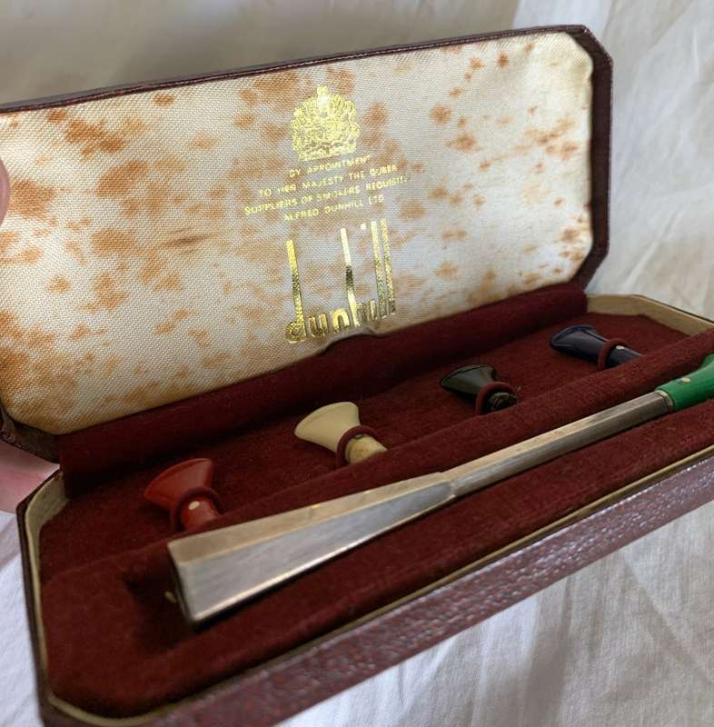 Dunhill silver cigarette holder, in box.