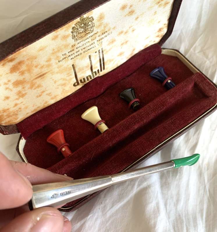 Dunhill silver cigarette holder, in box.
