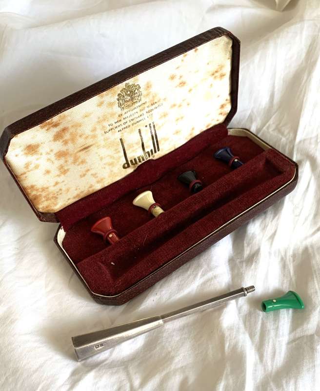 Dunhill silver cigarette holder, in box.