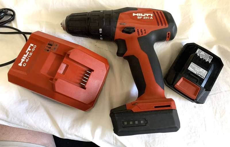 Hilti SF 2H-A Cordless Hammer Drill/Driver with charger and 2 batteries.