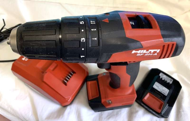 Hilti SF 2H-A Cordless Hammer Drill/Driver with charger and 2 batteries.