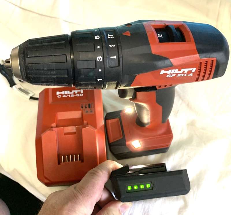 Hilti SF 2H-A Cordless Hammer Drill/Driver with charger and 2 batteries.