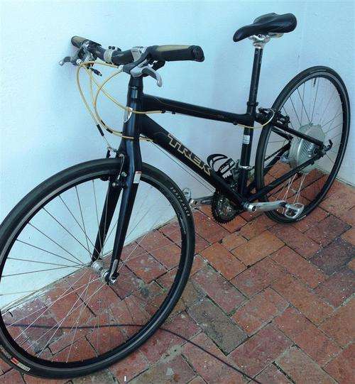 Trek 7.6 FX bicycle with electronic back wheel worth alone about R5000 with a carbon fork.