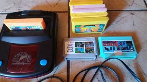 VINTAGE SPEEDY BOY CONSOLE WITH ALL CABLES AND 3 GAMES