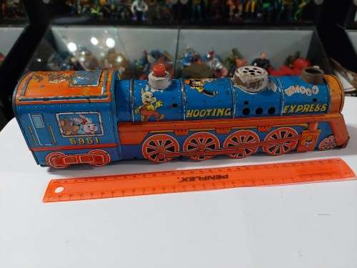 VINTAGE TIN TOY LOCOMOTIVE Vintage Figure