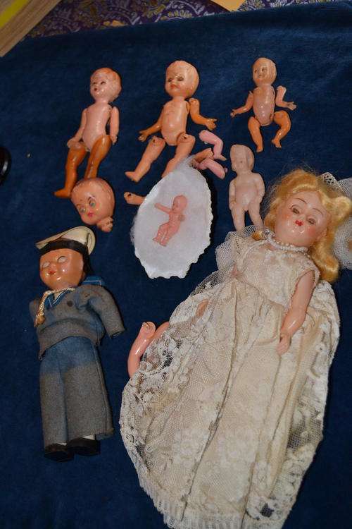 COLLECTION OF CELLULOID DOLLS AND PARTS
