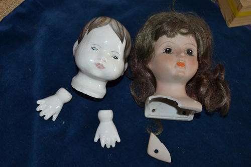 PORCELAIN DOLLS HEAD AND DOLLS HEAD WITH HANDS