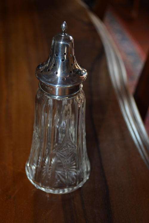 CRYSTAL SUGAR SHAKER WITH HALLMARKED SILVER TOP