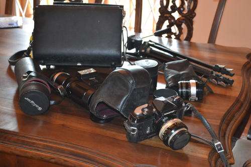 NIKOMAT CAMERA AND ACCESSORIES TRIPOD LENSES ETC