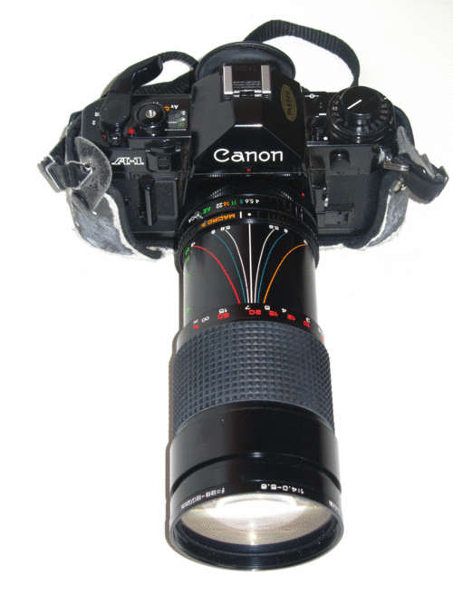 Canon A-1 SLR Camera with Lenses Etc.