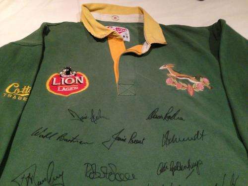 VERY VERY RARE 1992 first test back out of isolation signed by the team
