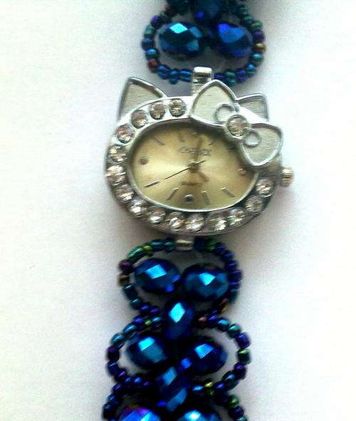 ***Don't miss THIS*** ONLY two available - HELLO KITTY WATCH with blue Beads